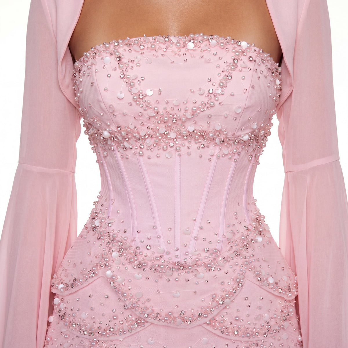 Close-up of the Azura baby pink boned corset, hand-sewn with crystals, sequins and pearl clusters