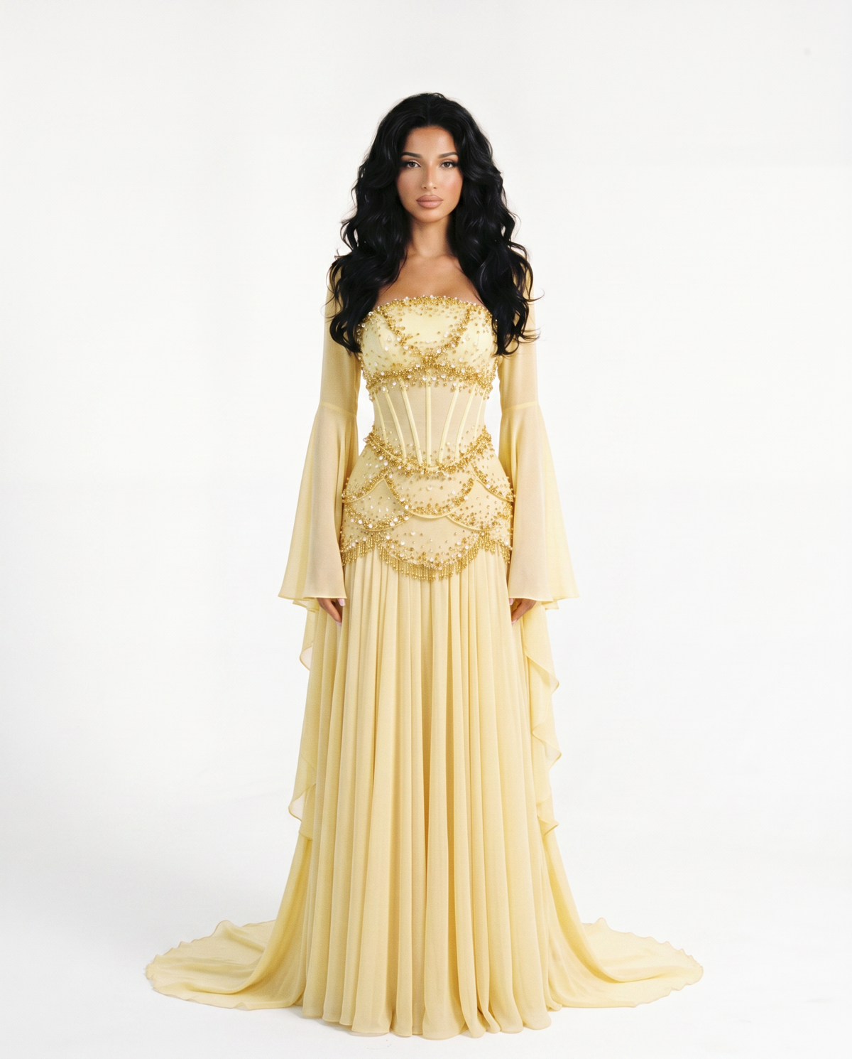 Model wearing the Azura buttercup yellow hand-beaded corset gown with detachable bell sleeves, full-length front view