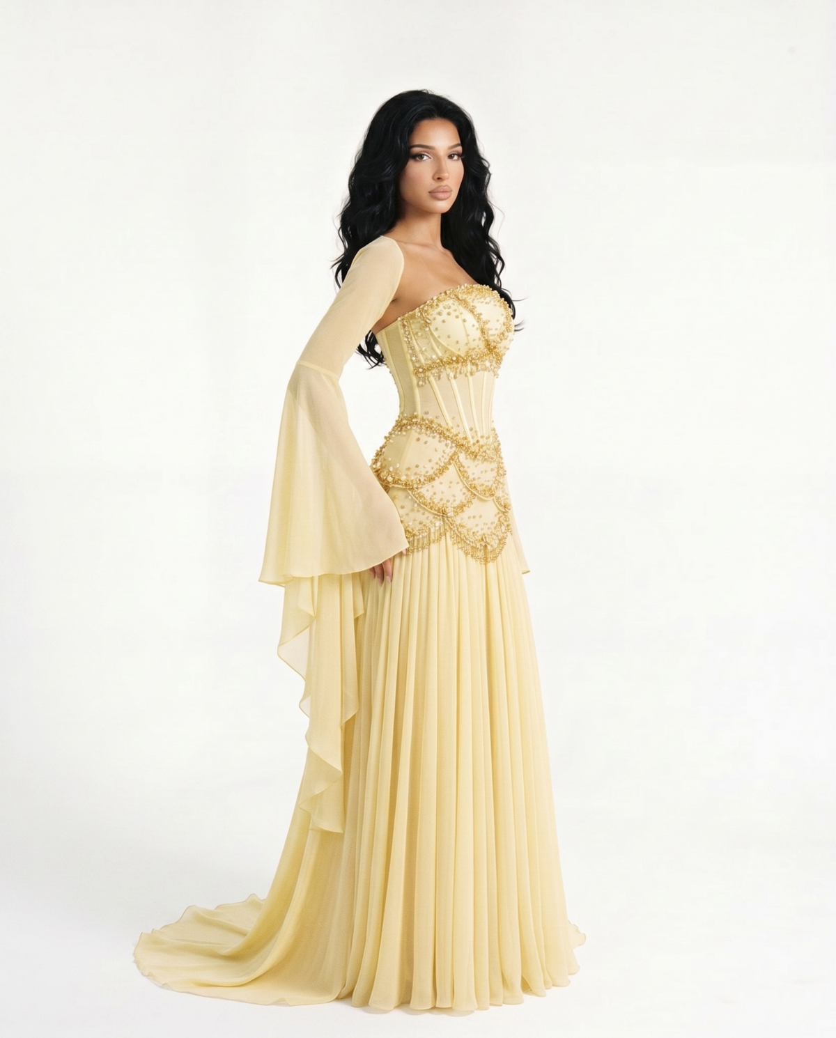 Side view of the Azura buttercup yellow gown showing the flowing bell sleeves and floor-length chiffon skirt