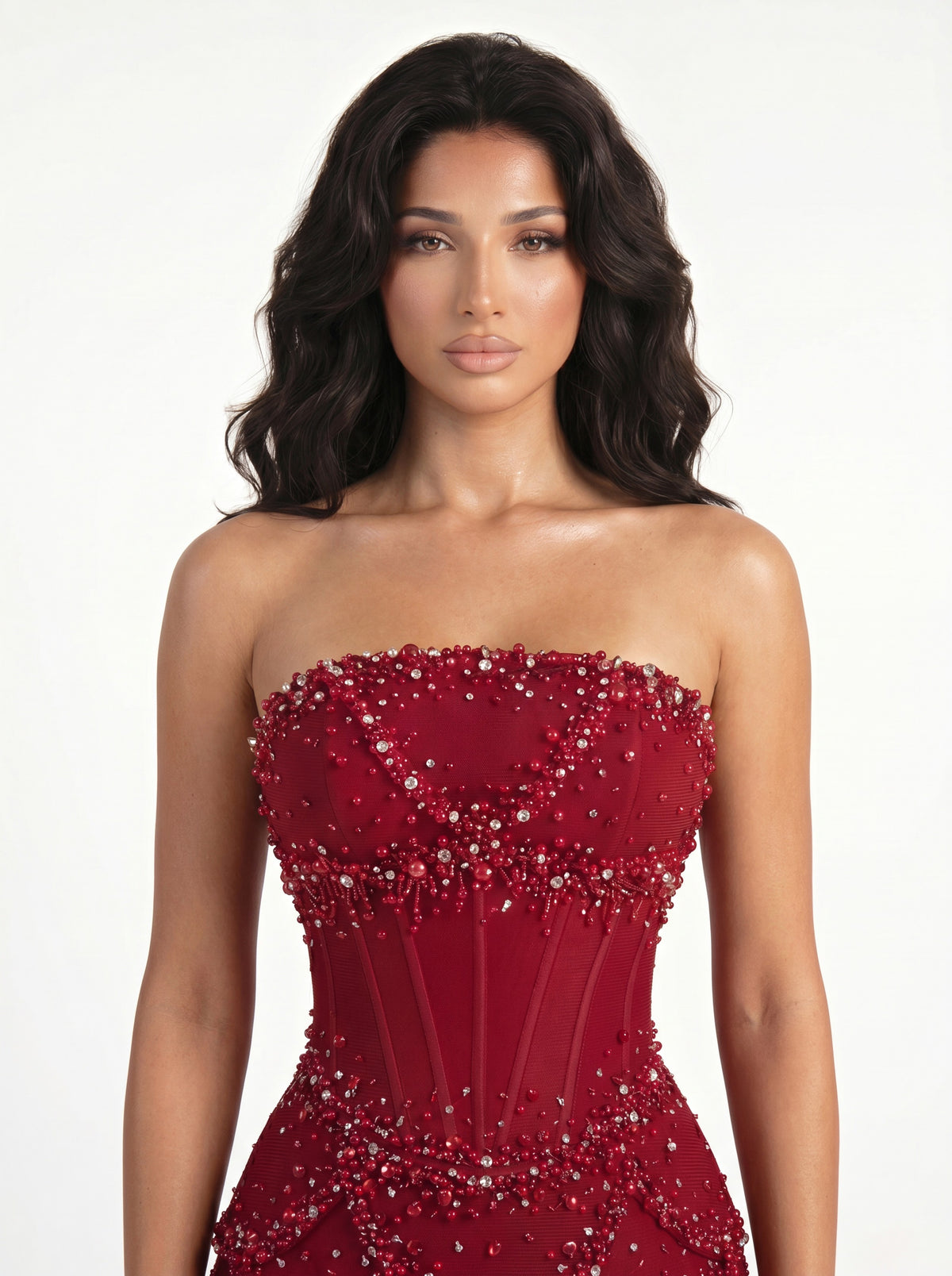 The Azura crimson red gown worn strapless with the sleeves removed, front view